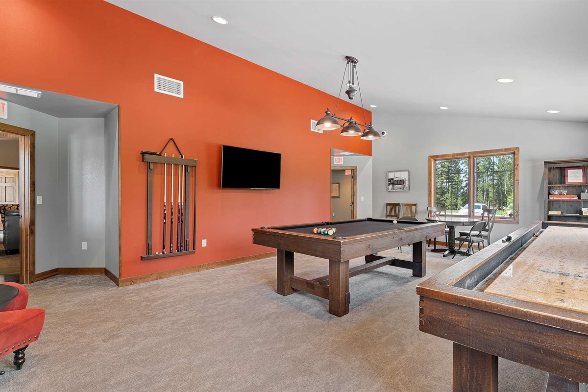 Game on! The PHP clubhouse features a pool table, shuffleboard, and lounge space—perfect for rainy days, group hangouts, or a little friendly competition.