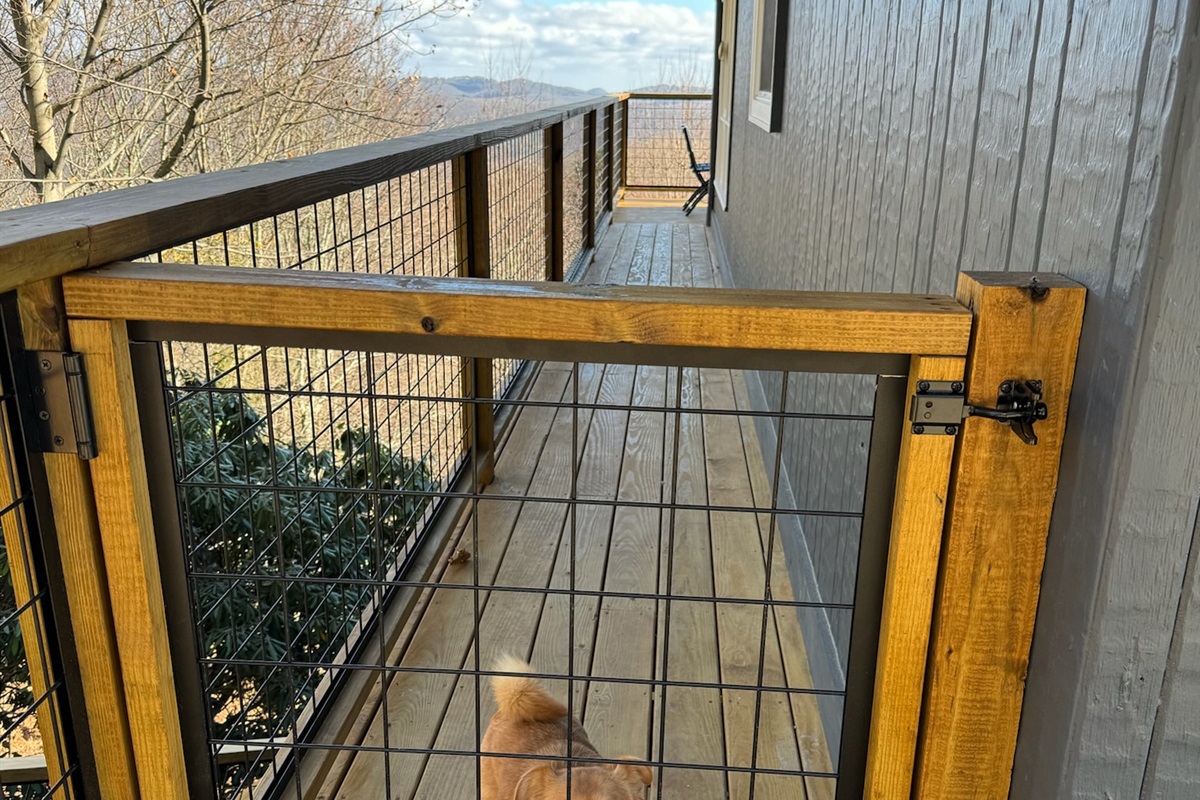 This gate connects the front porch by the front door to the main floor back deck. Our gates help you keep pets and toddlers safe! (Please supervise children & pets at all times) This should help you enjoy those amazing views even more!