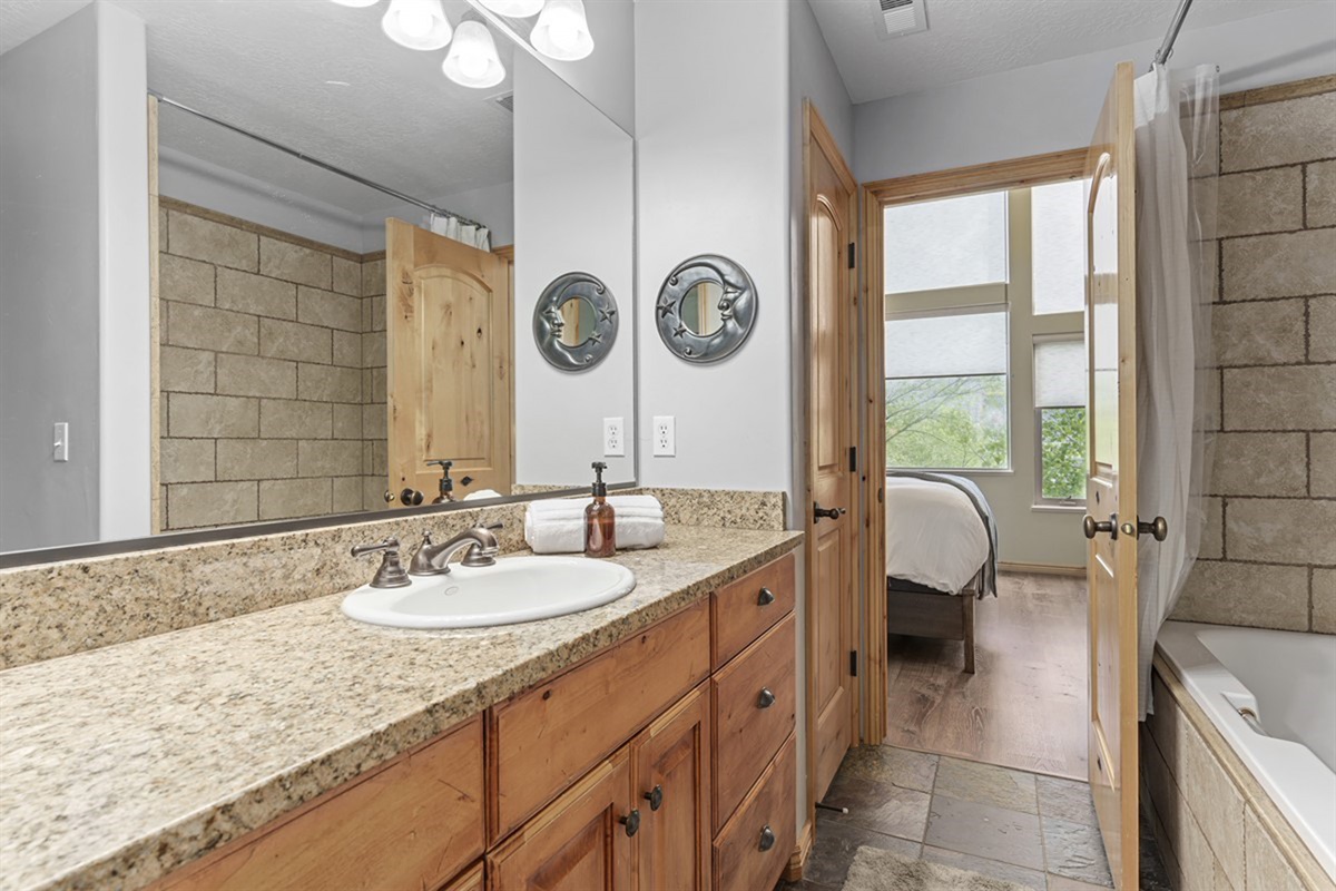 Spacious bathroom with a large vanity—plenty of room to get ready with ease.