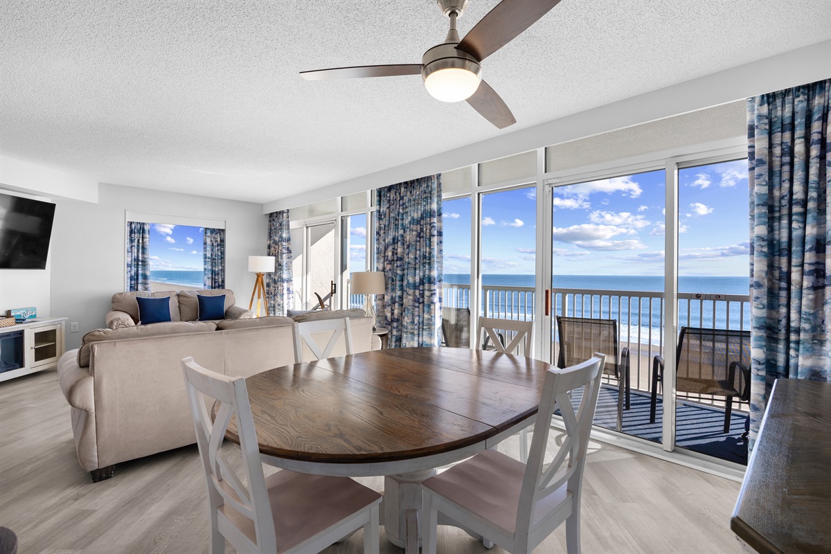Dining area and Living Room with Sliders to large balcony
