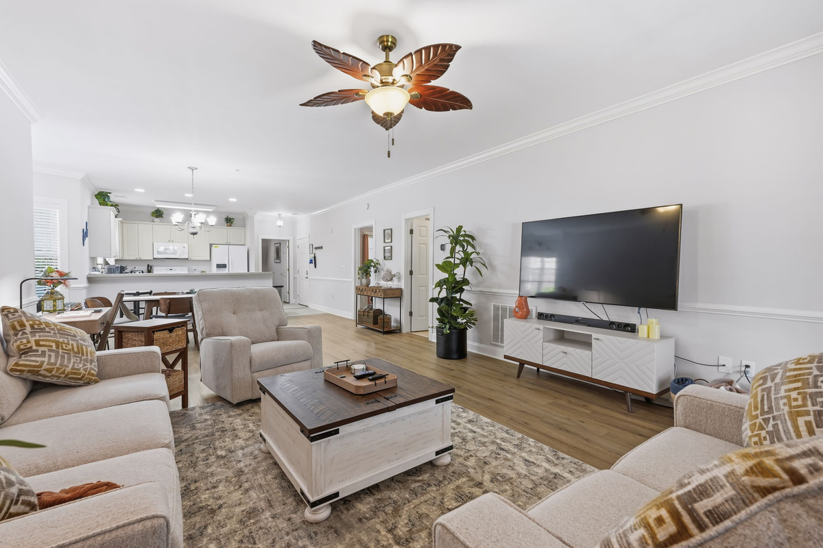 Enjoy the large and well designed living room with a view of the lake being you and easy access to everything in Myrtle Beach!