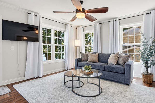 A separate sitting area and queen sleeper sofa give the primary suite even more room to relax.