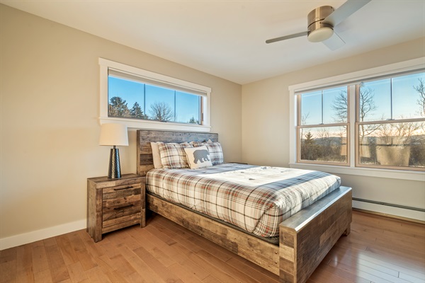 Comfortable second-level bedroom with a queen-size bed.