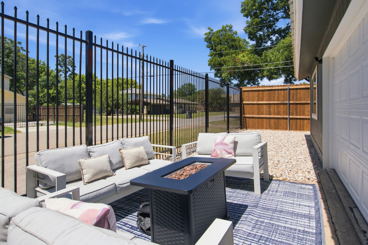 Relax under the Texas sun with plush seating and a fire pit for evening vibes!