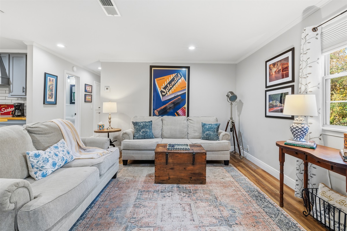 A bright, comfy living room built for relaxing—just stretch out, hit the remote, and feel at home.