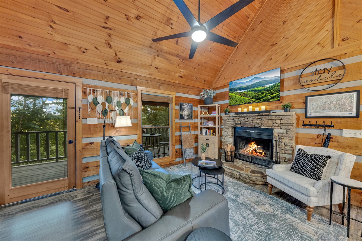 A crackling fireplace, comfy seating, and warm wood interiors make this the perfect place to unwind