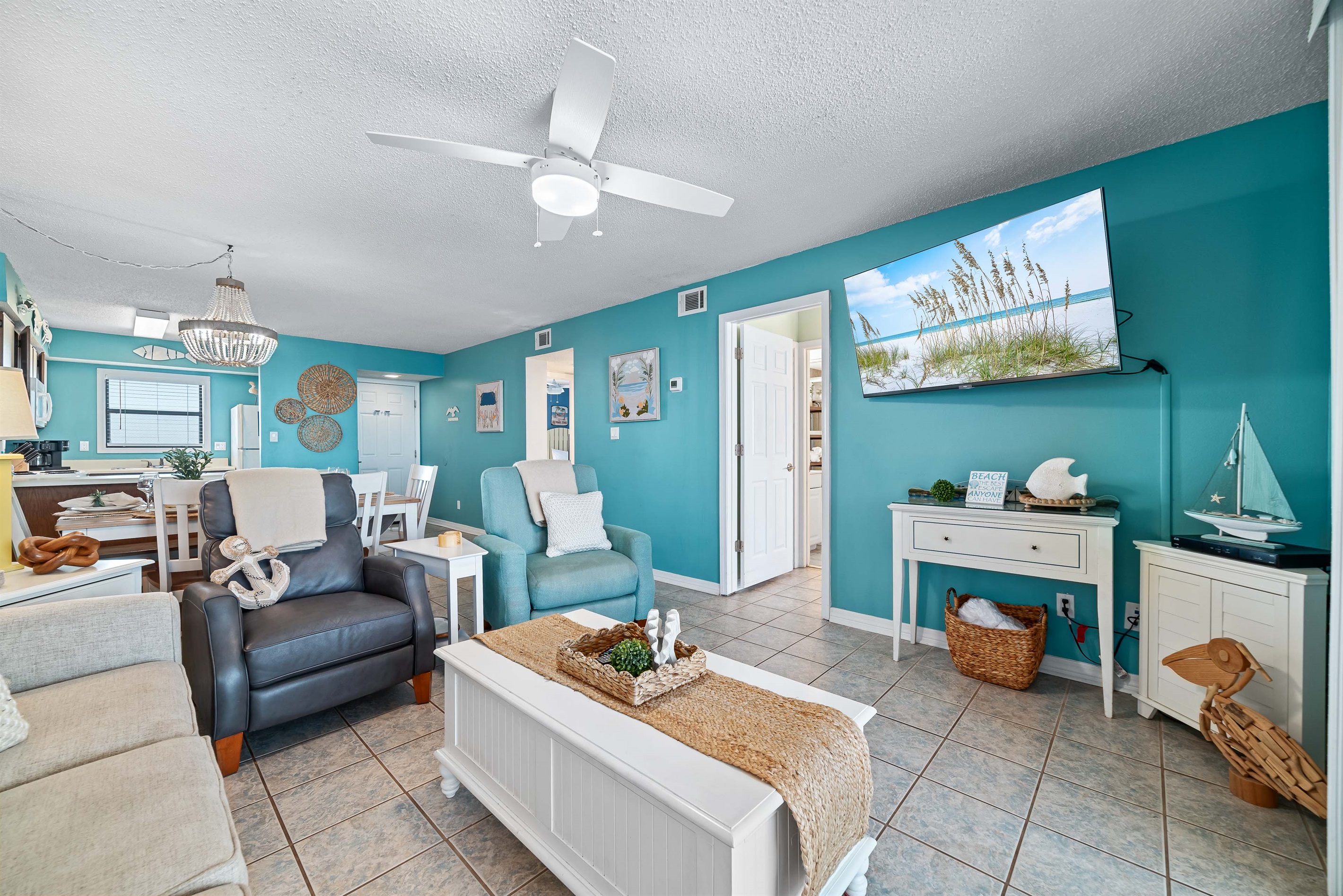 This well-appointed living space offers ample seating, elegant coffee table, and a dining area with seating for six, creating a welcoming atmosphere.