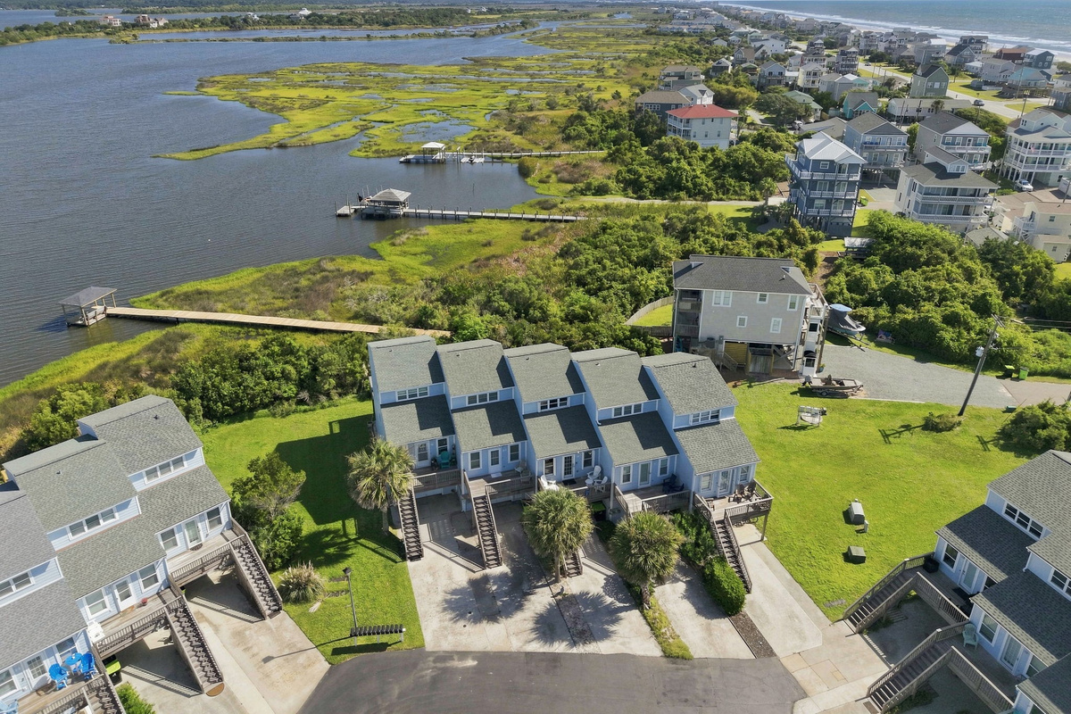 A gorgeous aerial snapshot highlighting the neighborhood's unique blend of seaside and soundside beauty.