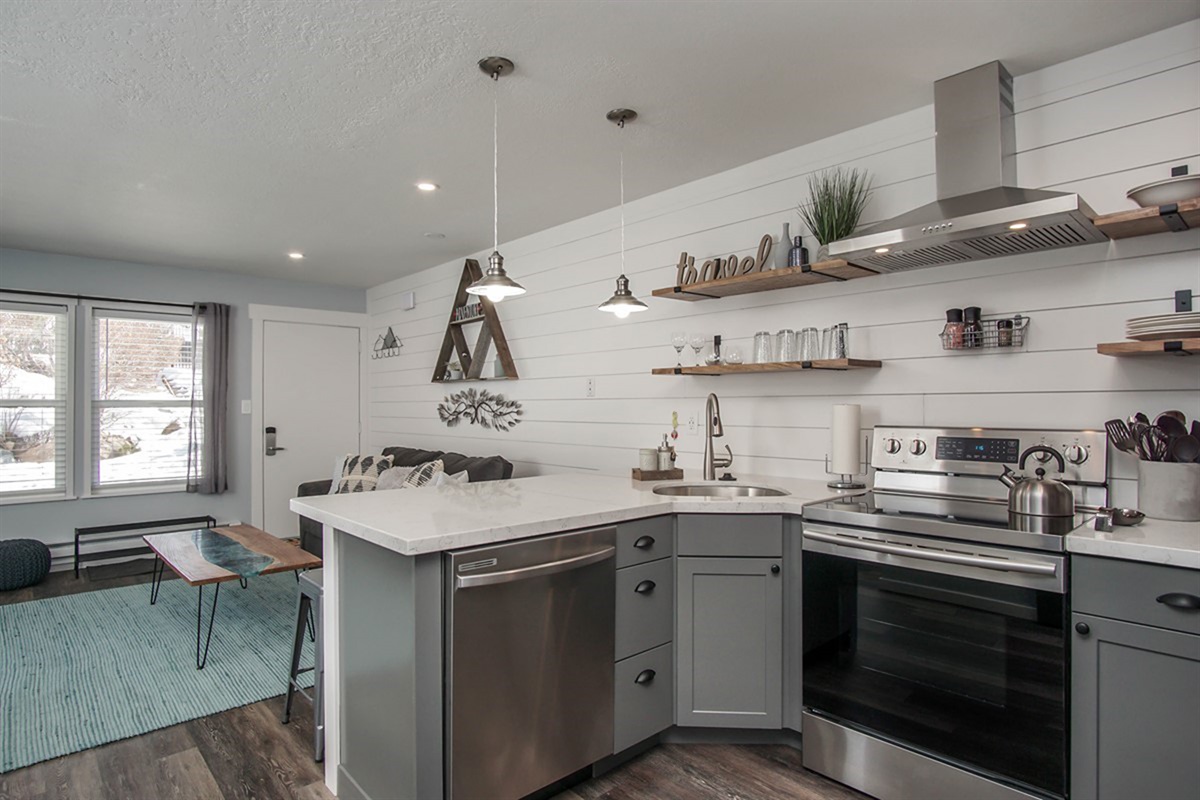 Bright kitchen and dining area with views into the living space—great for hosting.