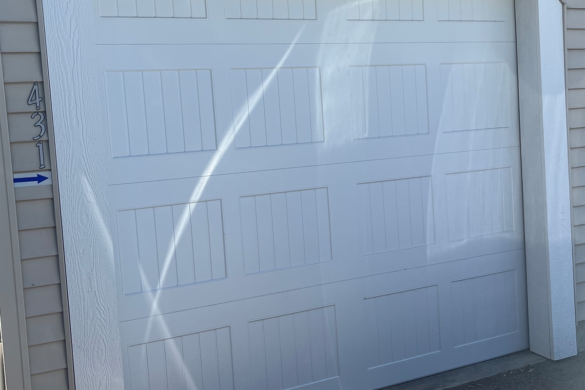 Parking for one vehicle is available in front of the garage door