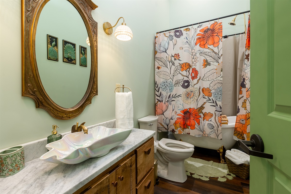 Hall bathroom with soaker tub and shower