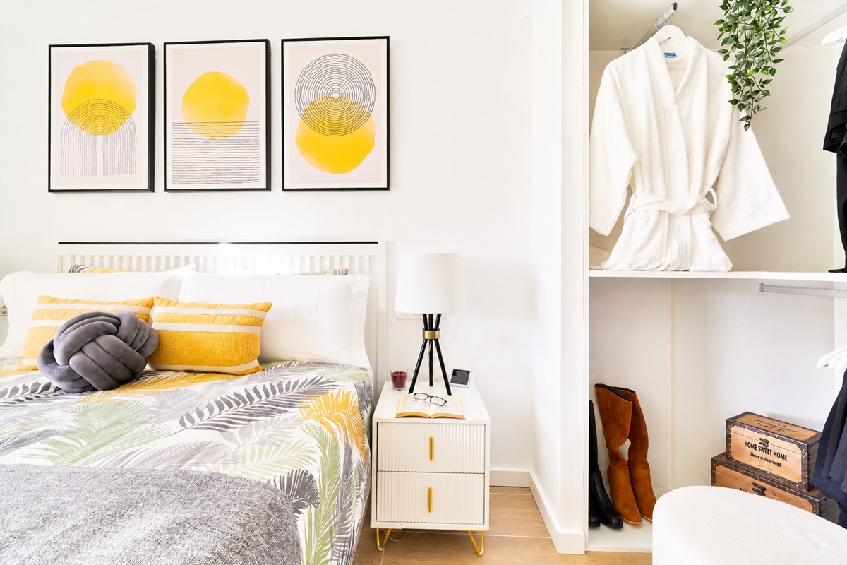 Bright and elegant master bedroom with a private terrace, walk-in wardrobe, and a serene atmosphere designed for restful nights.
