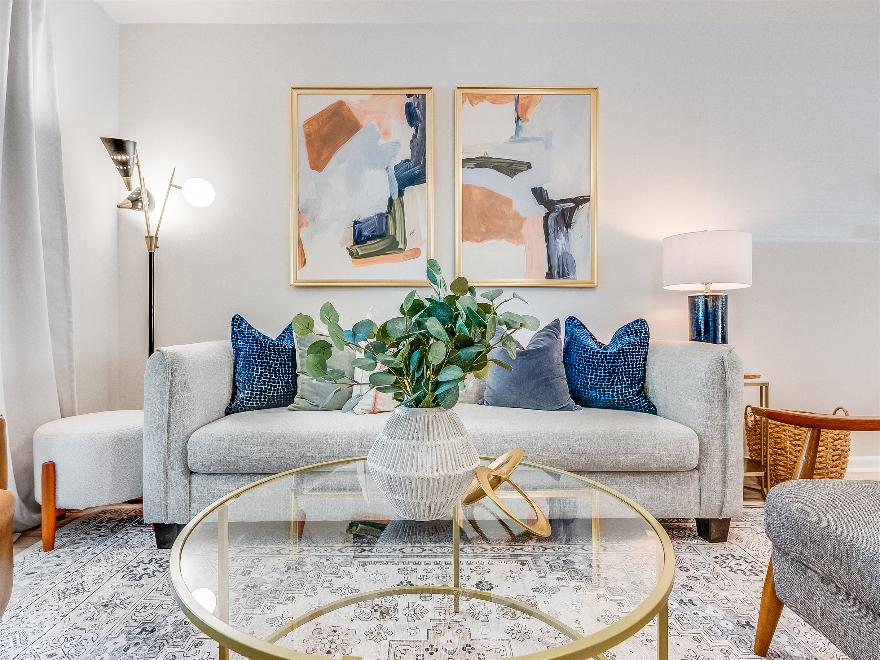 Cheerful accents and cozy seating bring warmth to the space.