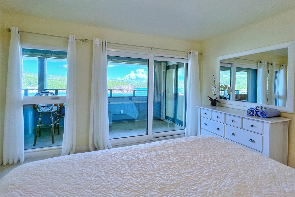 Large mirrors and natural light help the bedrooms feel as bright as they are peaceful.