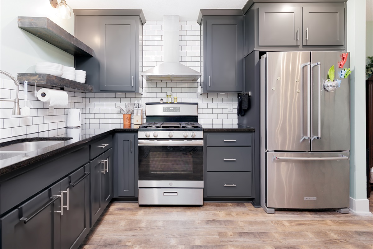 Well-designed kitchen featuring modern finishes, ample counter space, and stainless steel appliances.