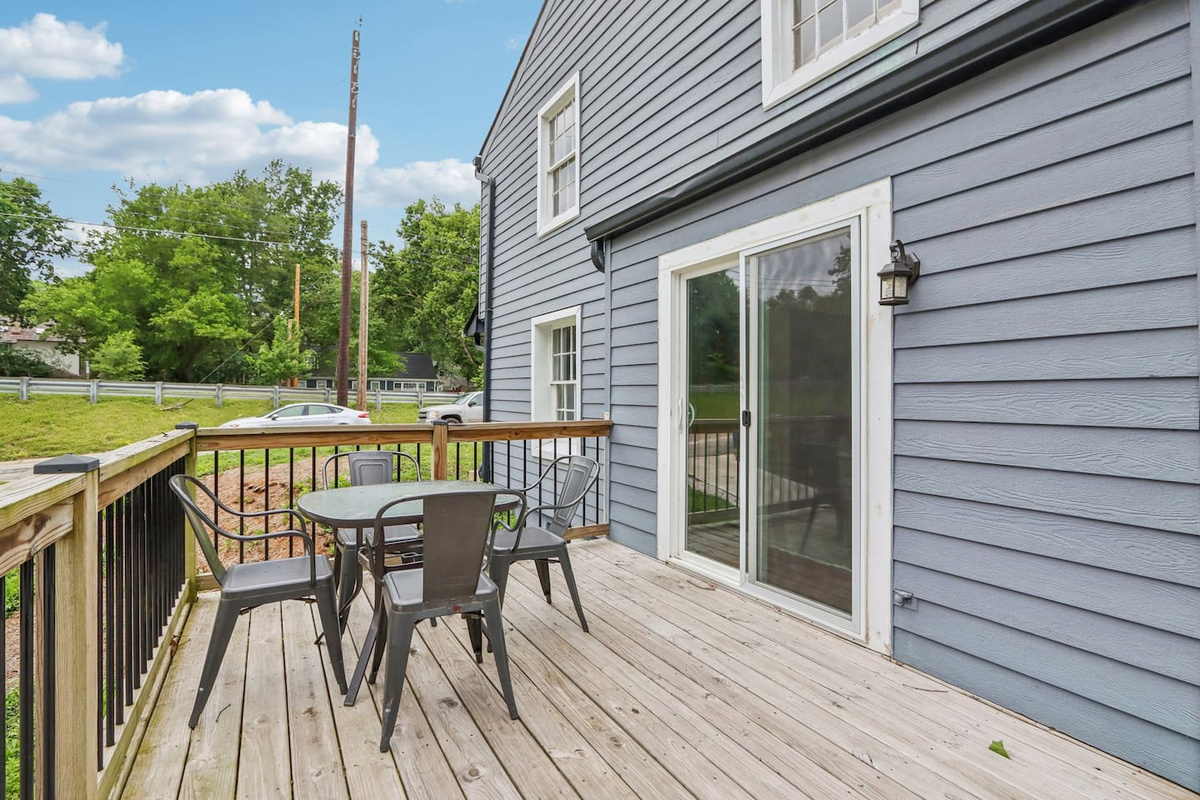 Enjoy easy outdoor dining on the spacious deck, with seating for four and direct access from the home.