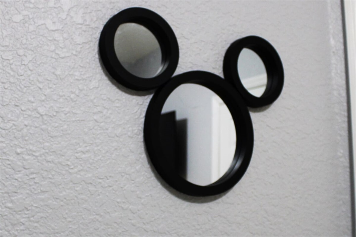 - Playful Mickey shaped wall mirror adds whimsical Disney charm to the decor  
- Perfect accent piece to bring a touch of magic to the home’s interior style  
- Fun detail for guests of all ages to enjoy during their stay in comfort  
