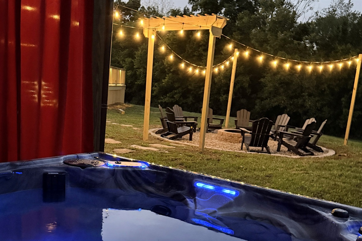 Evenings made for connection — slip into the hot tub as the string lights glow and laughter drifts from the firepit. Every night here ends in warmth, conversation, and calm.