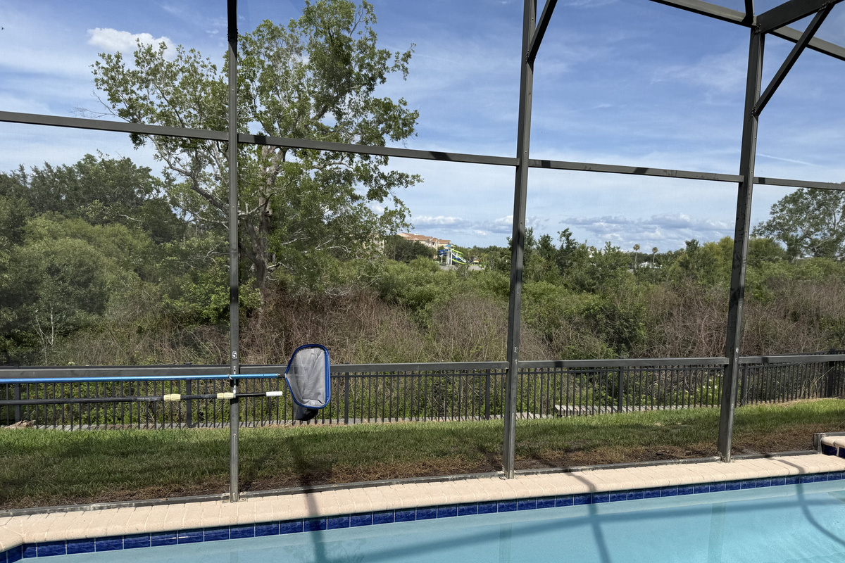 A rare Windsor Hills setting with privacy and views stretching all the way to the clubhouse.