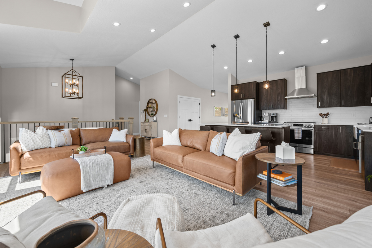Spacious great room with comfortable seating creates the perfect gathering place after a day on the slopes or trails.