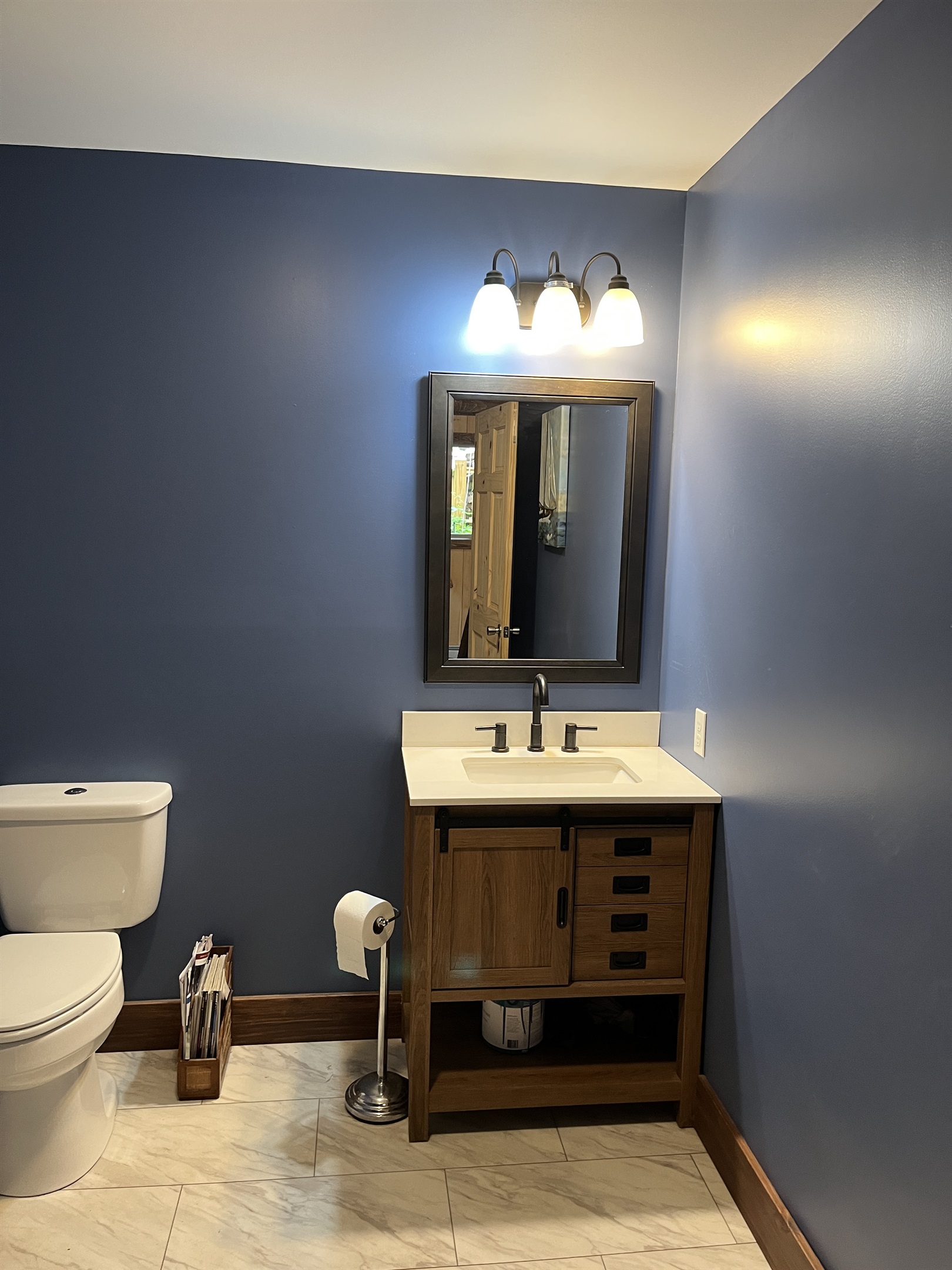 Main level 1/2 bath off kitchen