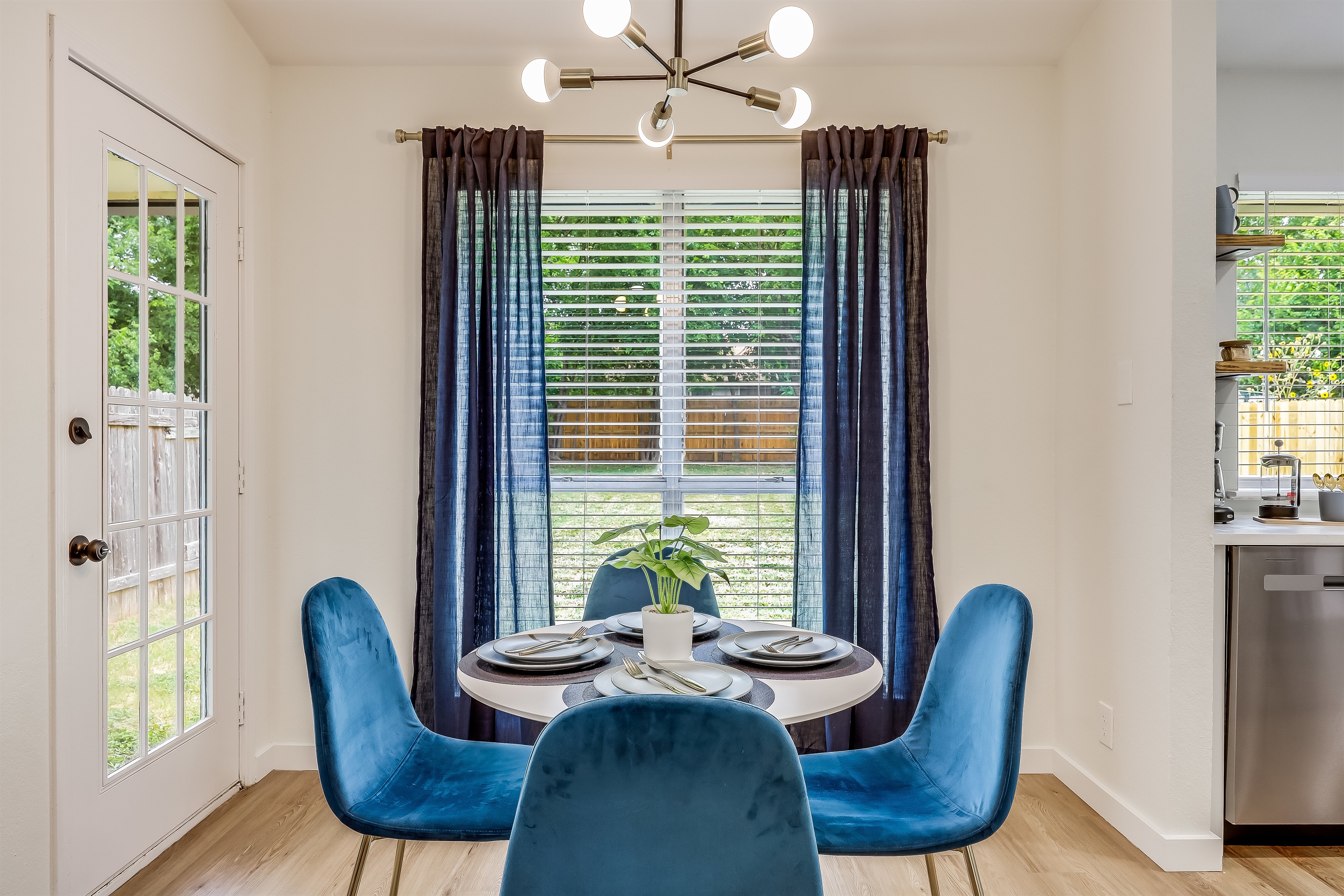 Dining Area - Enjoy your meals while looking at the birds visiting the trees in the backyard.