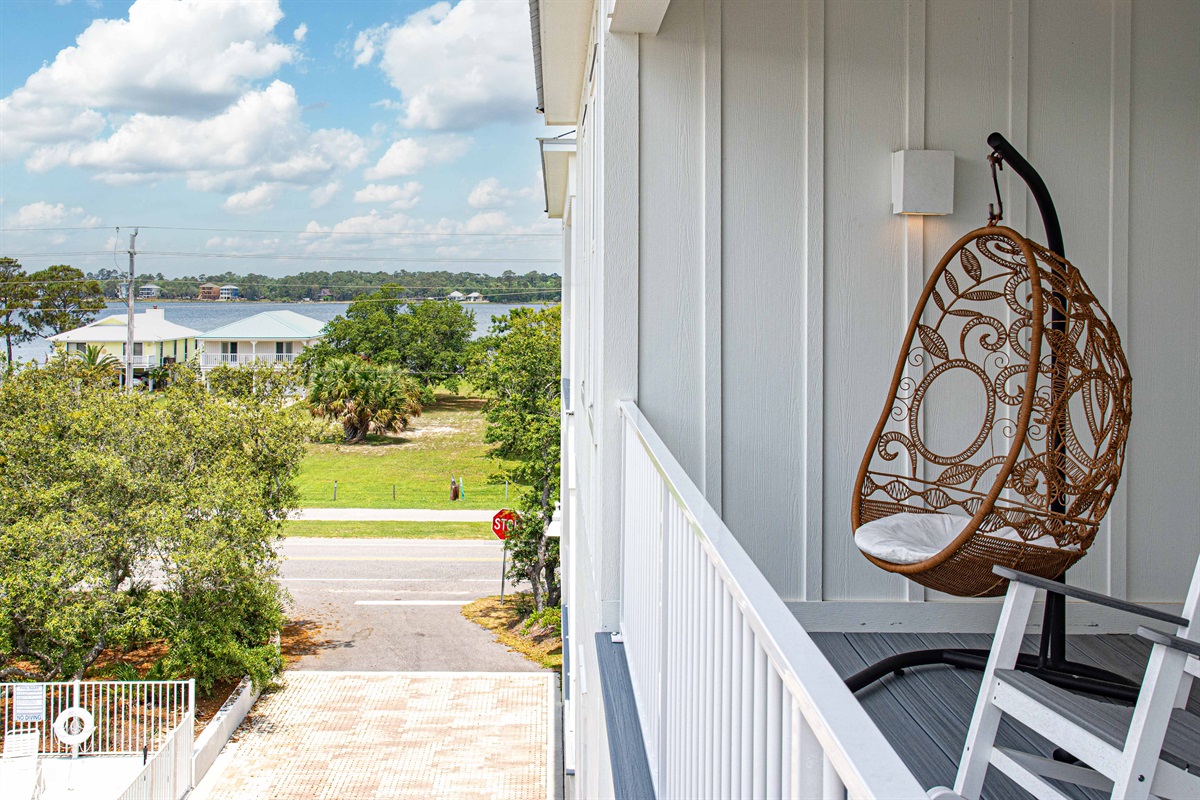Beautiful view of the lagoon from the upstairs balcony. This balcony is accessed through the landing and a primary bedroom.