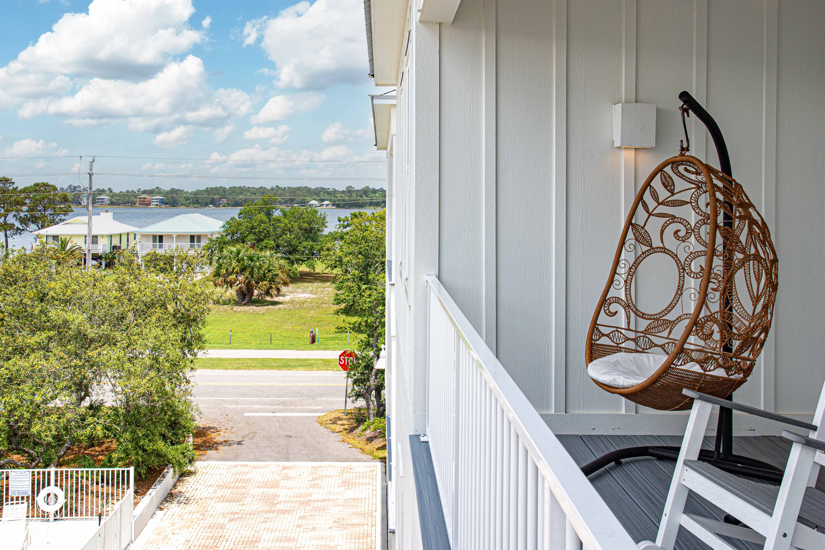 Beautiful view of the lagoon from the upstairs balcony. This balcony is accessed through the landing and a primary bedroom.