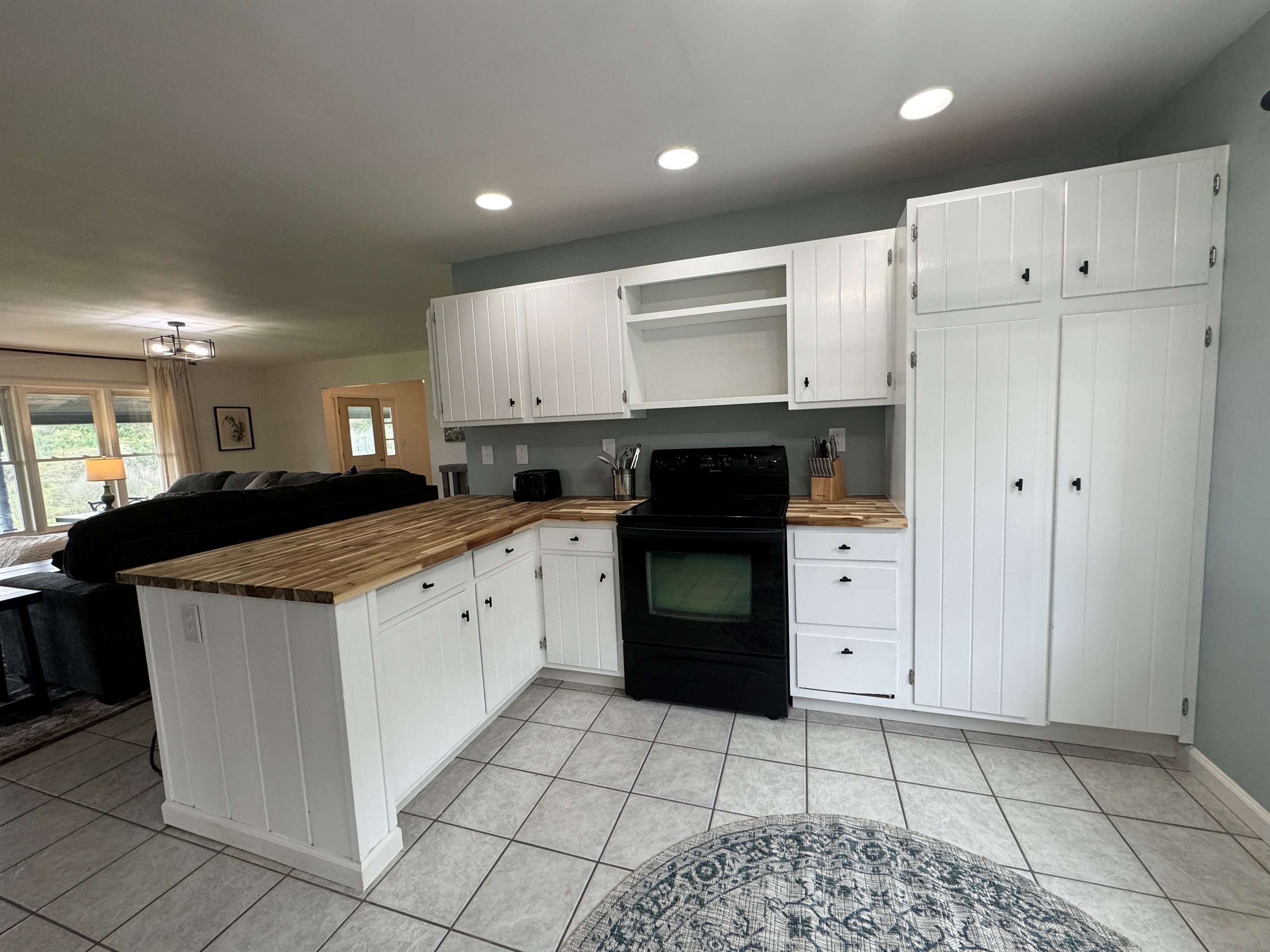 Kitchen with living room beyond