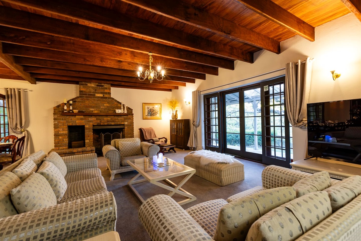 Large comfy Lounge room in front of the fire