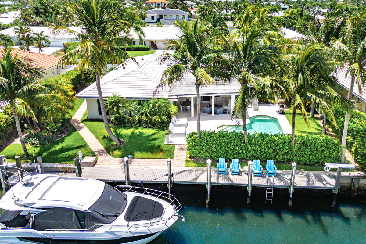The boat shown is privately owned and not available for guest use. A separate portion of the dock is available for approved guest boats, subject to size restrictions and an additional fee.