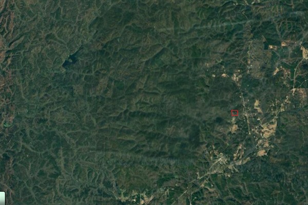 This gives some idea of the surrounding land.  The property is located in the red square.