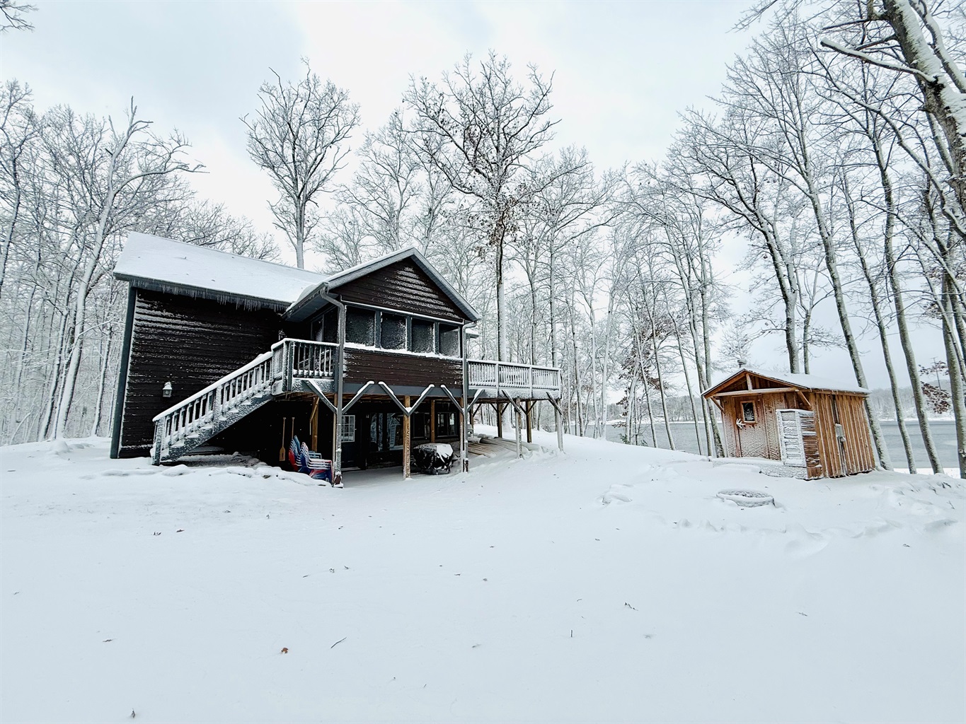 Our authentic wood burning sauna with a great view of the lake.