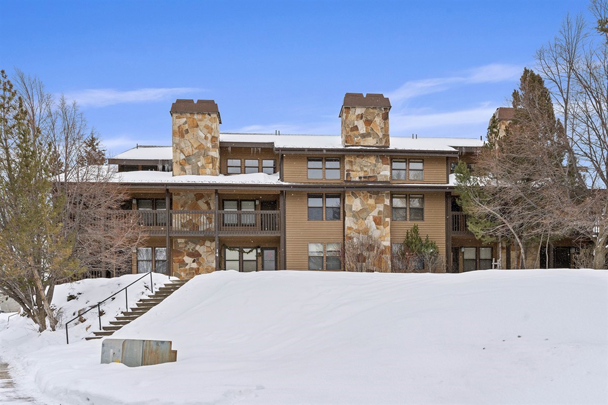 Exterior view of Wolf Lodge property—nestled in a scenic, year-round mountain destination.