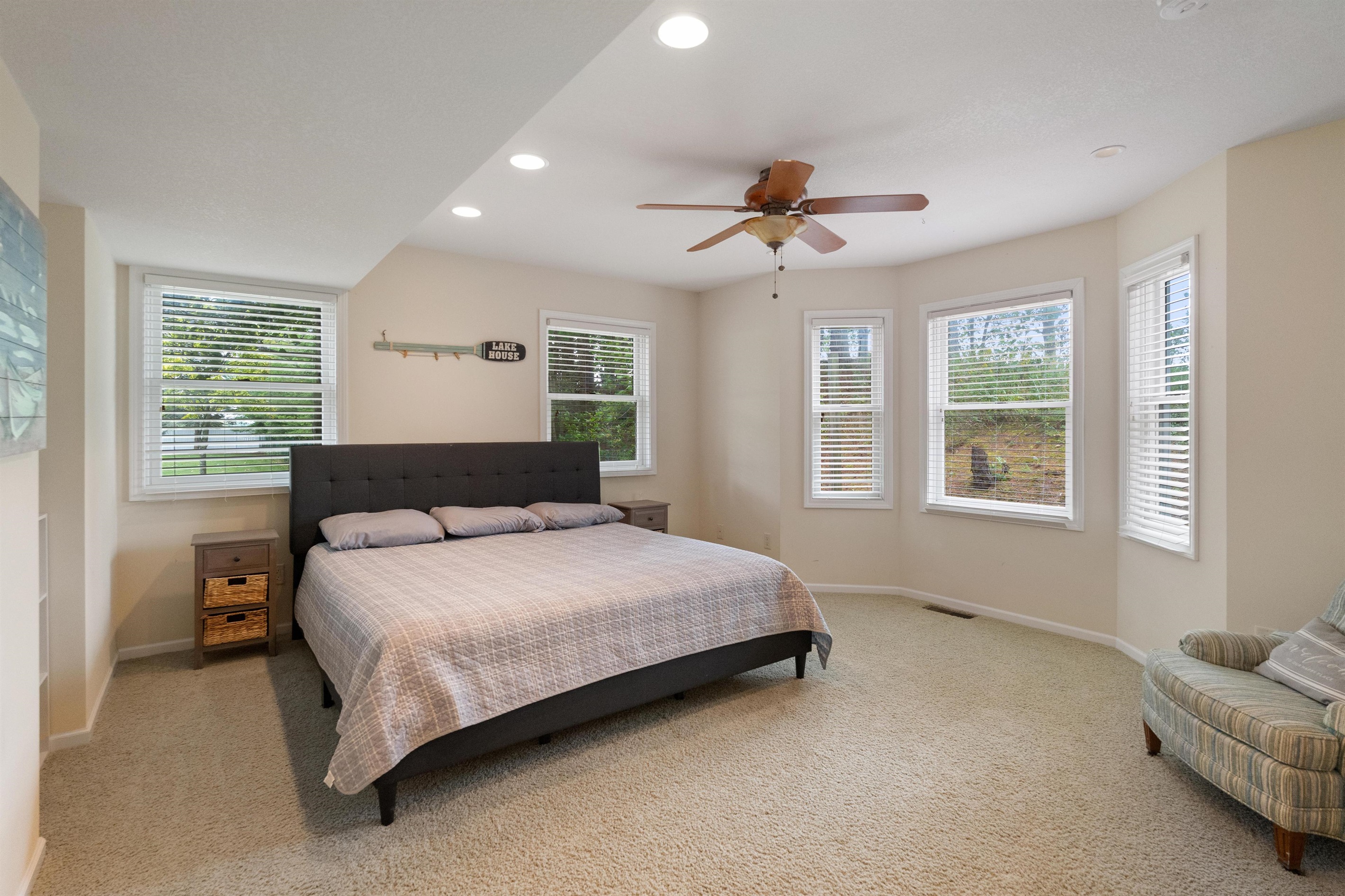 1st floor king sized bedroom with excellent wrap around views and a connected full bathroom