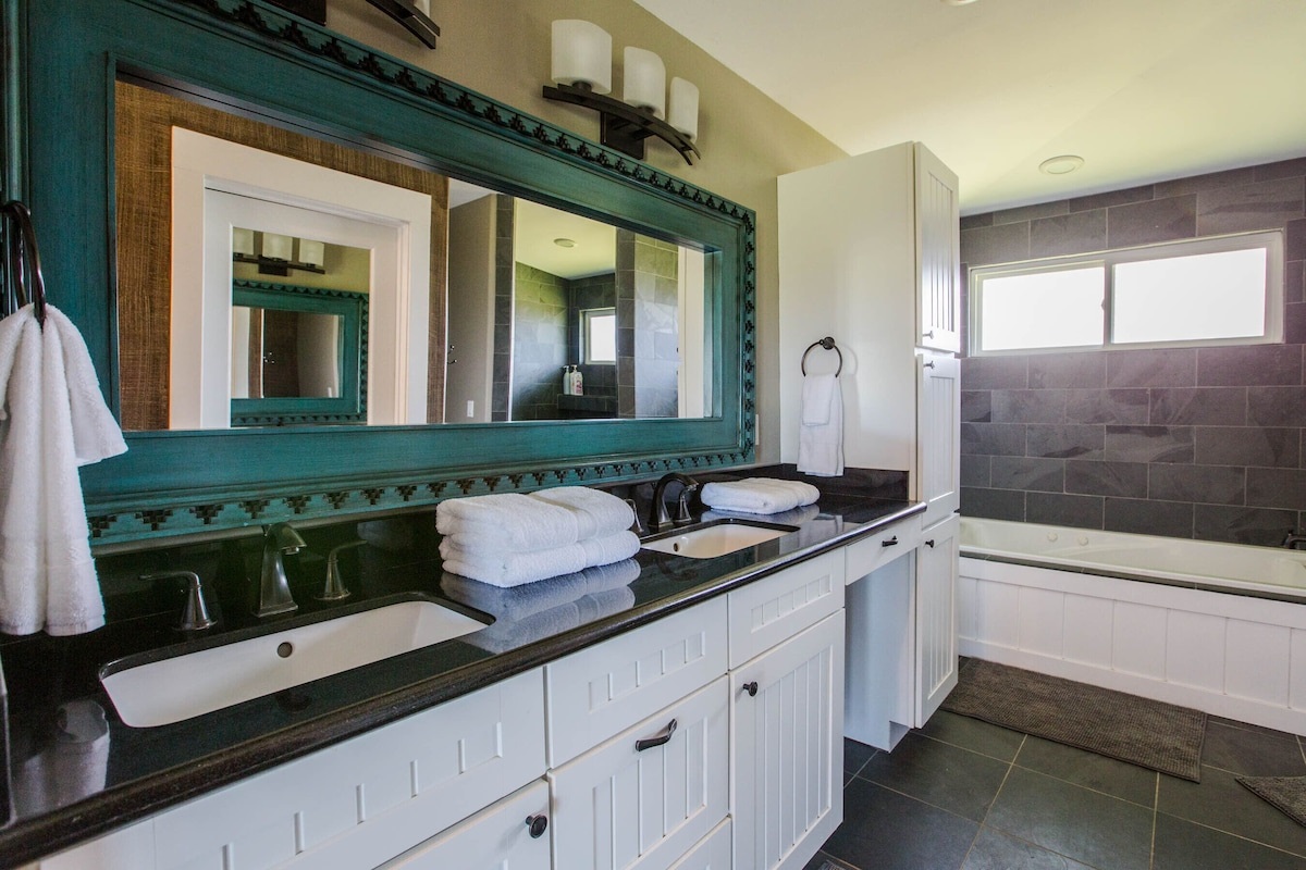 Primary bath with dual sinks.