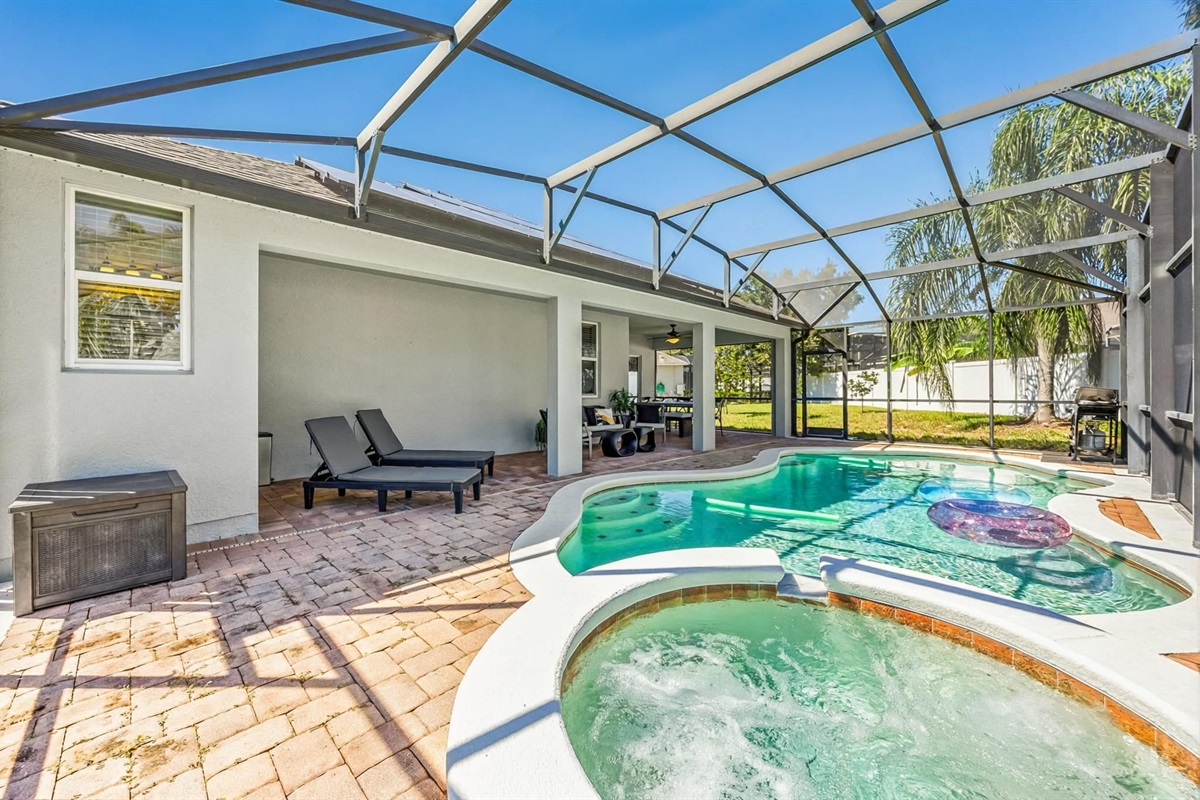 Spacious patio with loungers, dining area, and poolside views — everything you need for ultimate relaxation and fun in the sun.