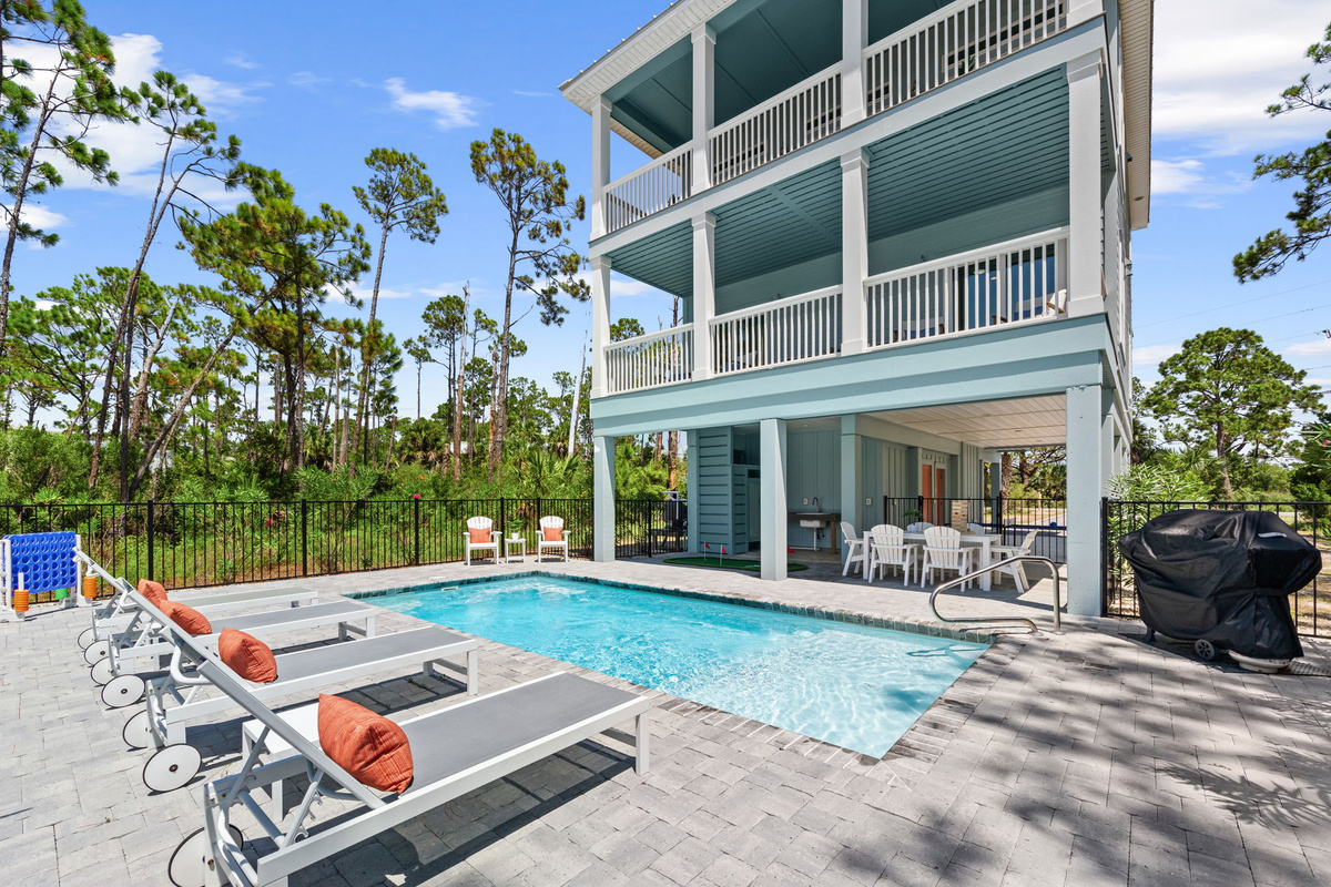 Cool off in the private pool after a day at the beach, then relax poolside on the comfortable lounge chairs and listen to the waves.