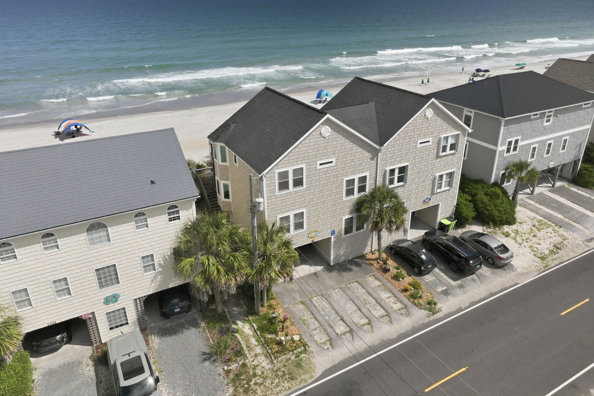 Street level oceanfront view with driveway access
