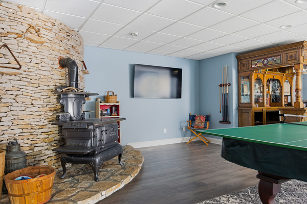 Ping Pong / Pool Table, Wood Stove (decorative), and Bar area