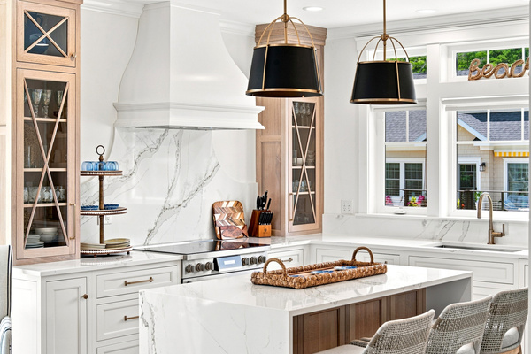 Beautiful finishes, generous counter space, and a statement range create a kitchen you'll actually enjoy cooking in.