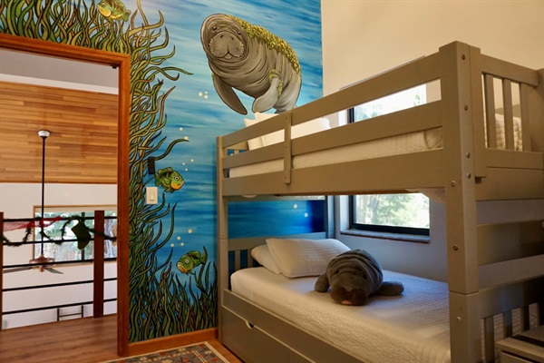 Bunk Room with Manatee Mural from local Artist Gnarly Carly