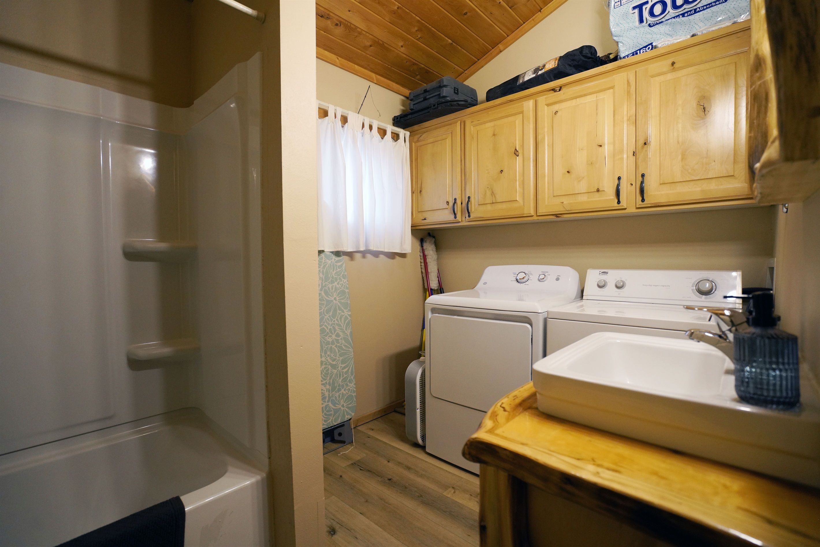 Main bathroom with laundry