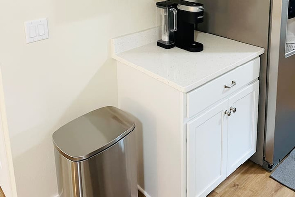 Coffee Bar which has Keurig, regular coffee pot and Moka pot for espresso lovers.  Their are pods, coffee grounds and tea.  There is also an electric kettle. 