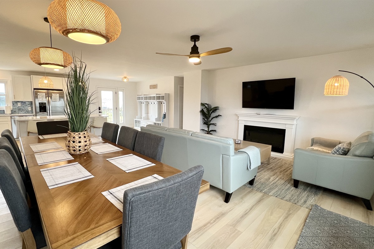 Open space gives views of the large smart TV and electric fireplace from anywhere.