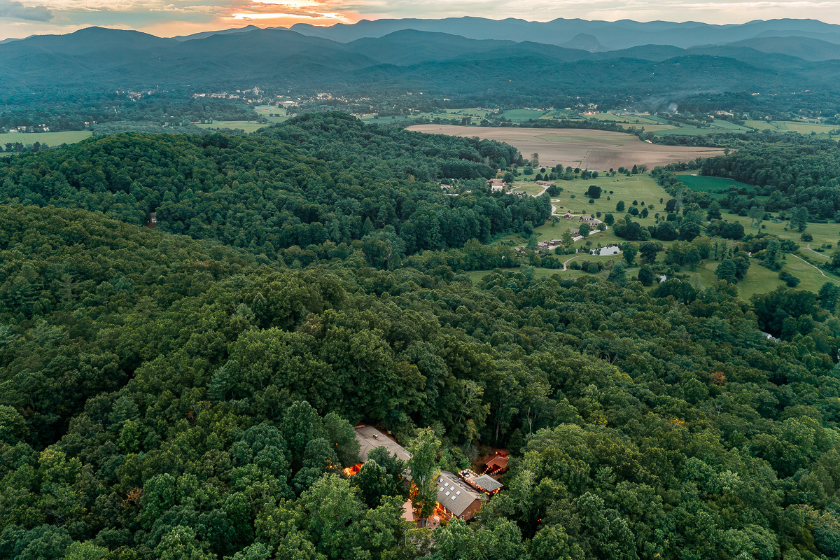 {Private Forest Resort} Tucked into acres of forest with sweeping mountain views, Canopy Club feels completely removed from the everyday.