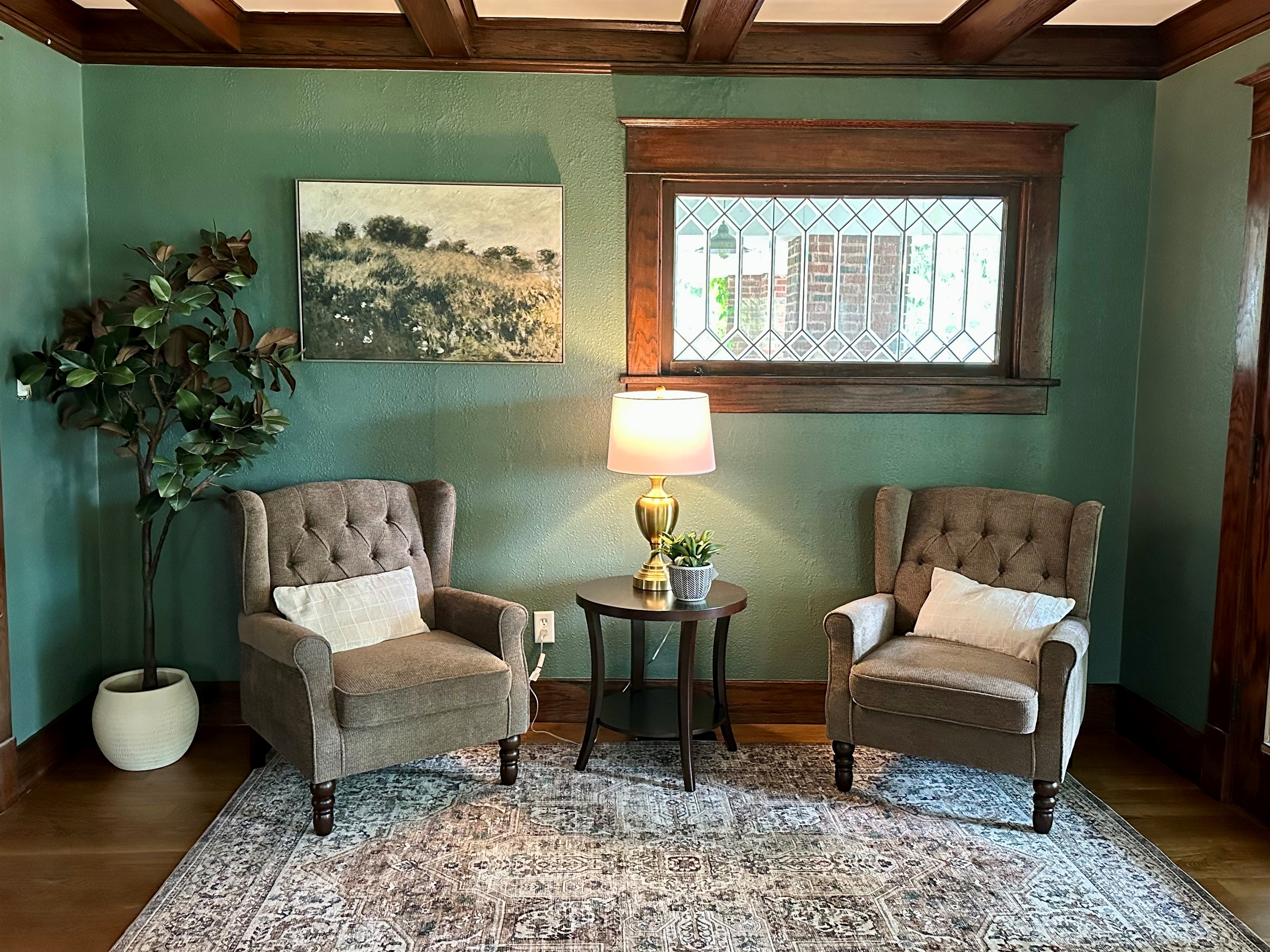 A quiet corner to slow down and reconnect. Whether you’re sipping morning coffee, diving into a good book, or winding down for the day, this cozy sitting area was designed for peaceful moments. 