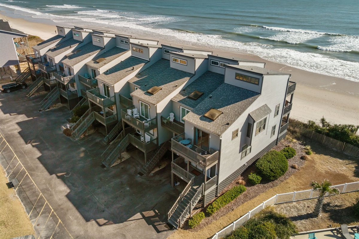 A relaxed oceanfront setting where families can enjoy beach days just steps from the home