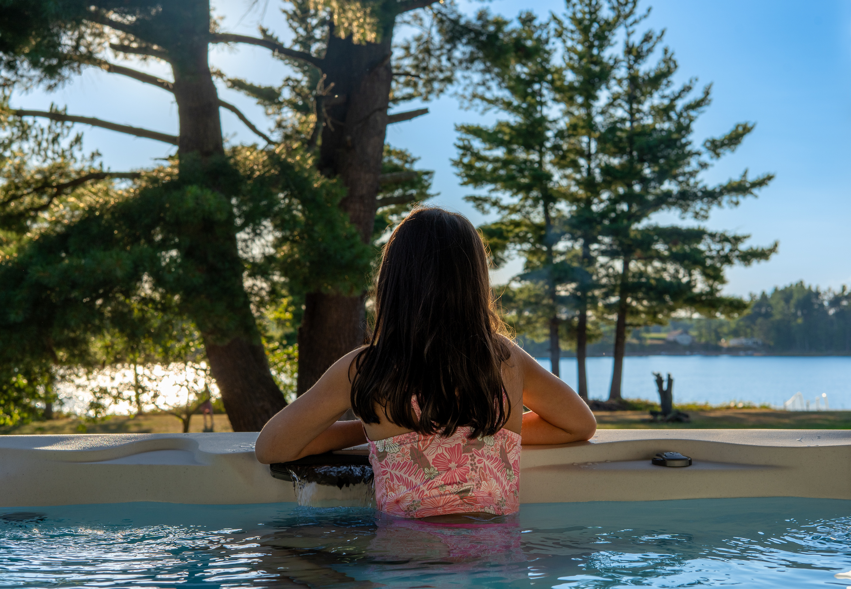 Soak up the view at your brand new 7-seat hot tub overlooking the lake