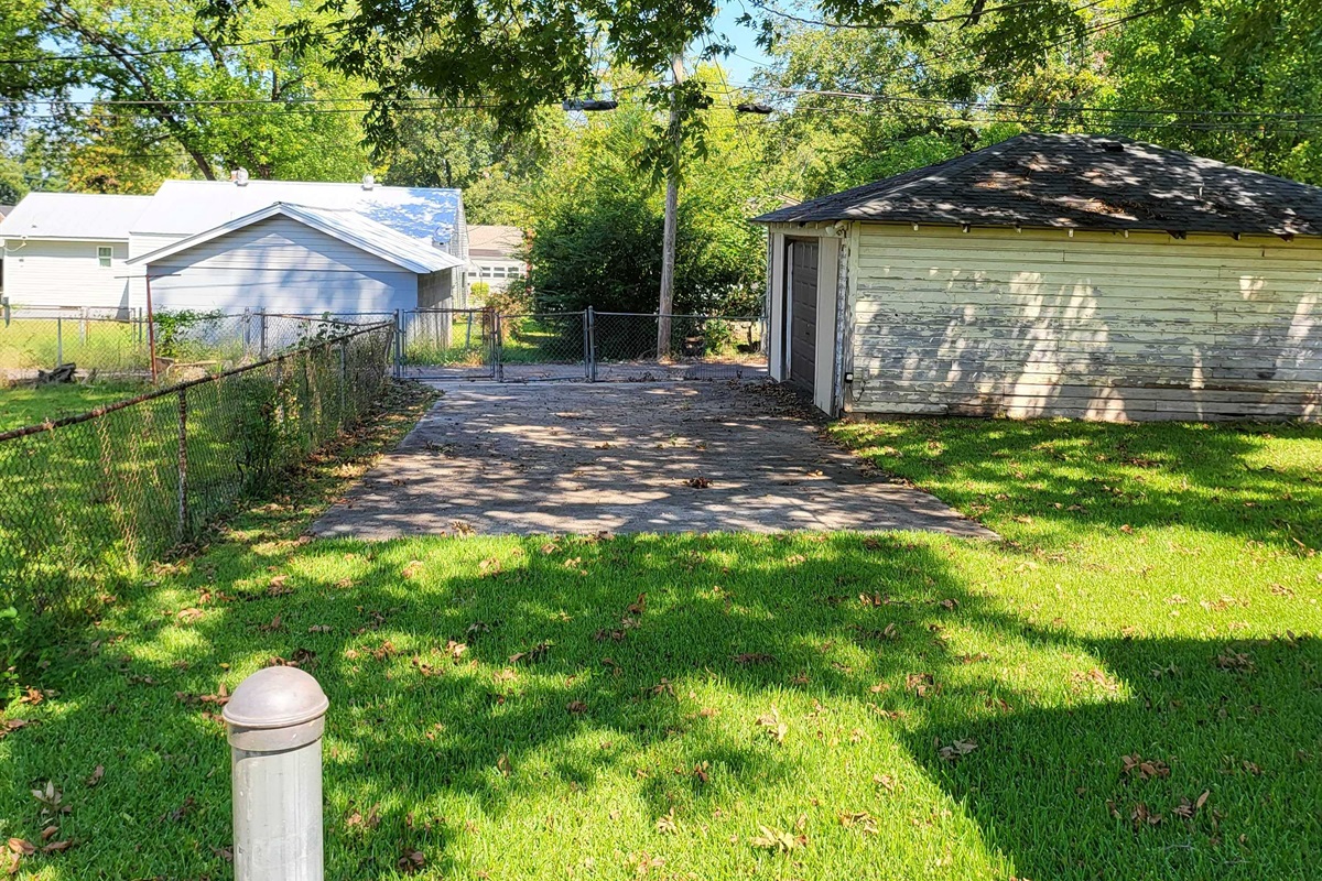 Let the day wind down in a spacious yard made for relaxing, playing, or simply being still